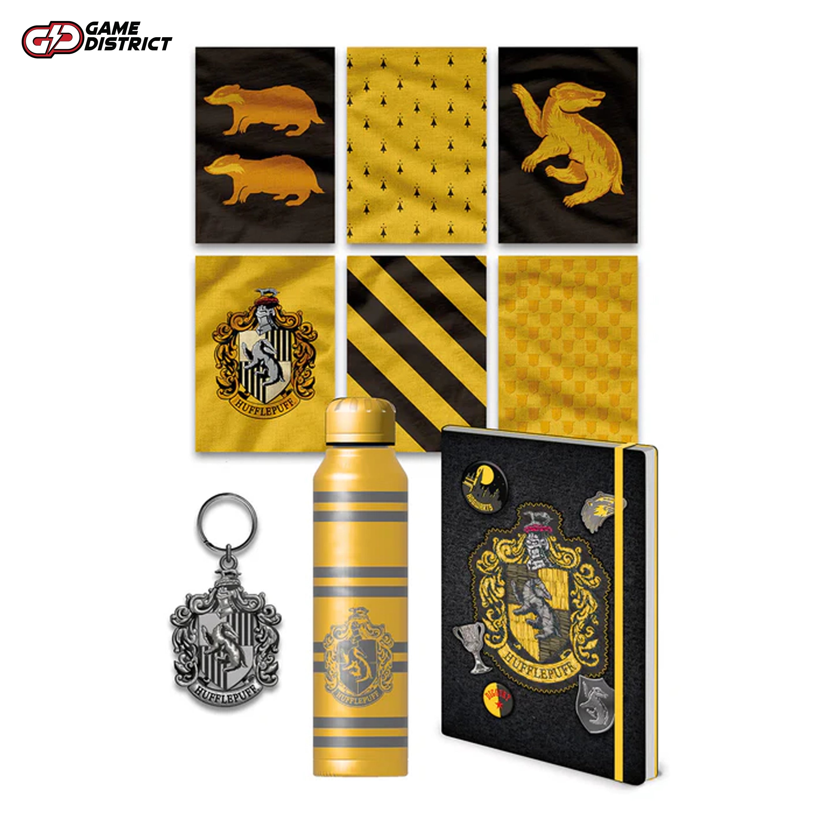 Image of the Harry Potter Hufflepuff House Deluxe Gift Collection, featuring a trunk, notebook, water bottle, keyring, and postcards.