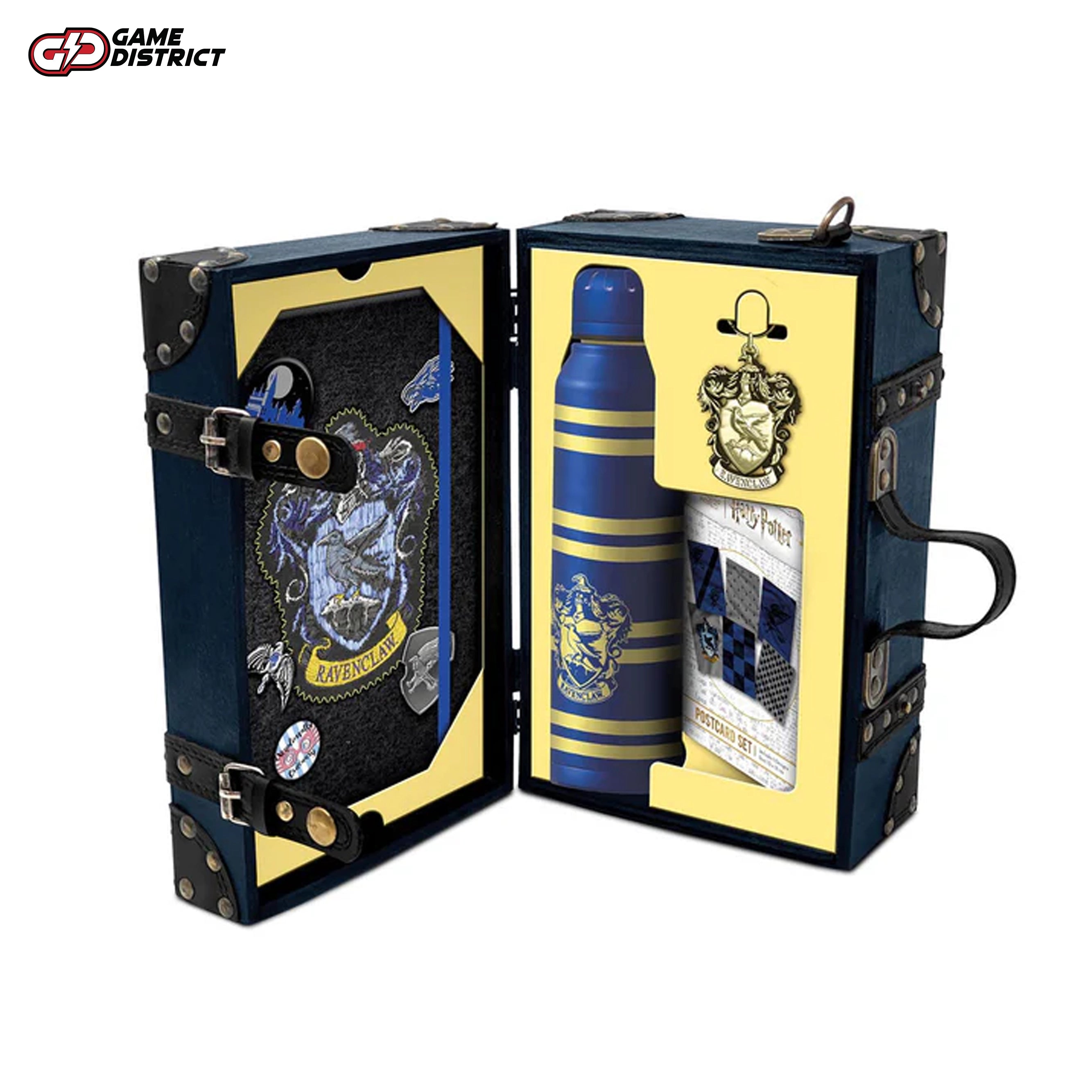 Harry Potter Ravenclaw House Deluxe Gift Collection featuring a themed trunk with a shoulder strap Premium A5 notebook with the Ravenclaw crest from the gift set for Harry Potter fans. Durable metal water bottle showcasing the Ravenclaw emblem, part of the deluxe collection Ravenclaw-themed keyring and postcards included in the Harry Potter gift set. Complete Ravenclaw Deluxe Gift Collection displayed with its themed trunk and accessories