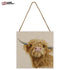 "Jane Bannon (Donald) 20x20cm wooden block featuring a printed design with crisp white edges."
"Close-up of Jane Bannon (Donald) wooden panel showcasing natural woodgrain and attached hanging string for easy mounting."